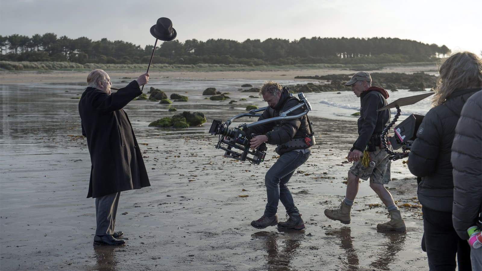 Churchill filming on the beach