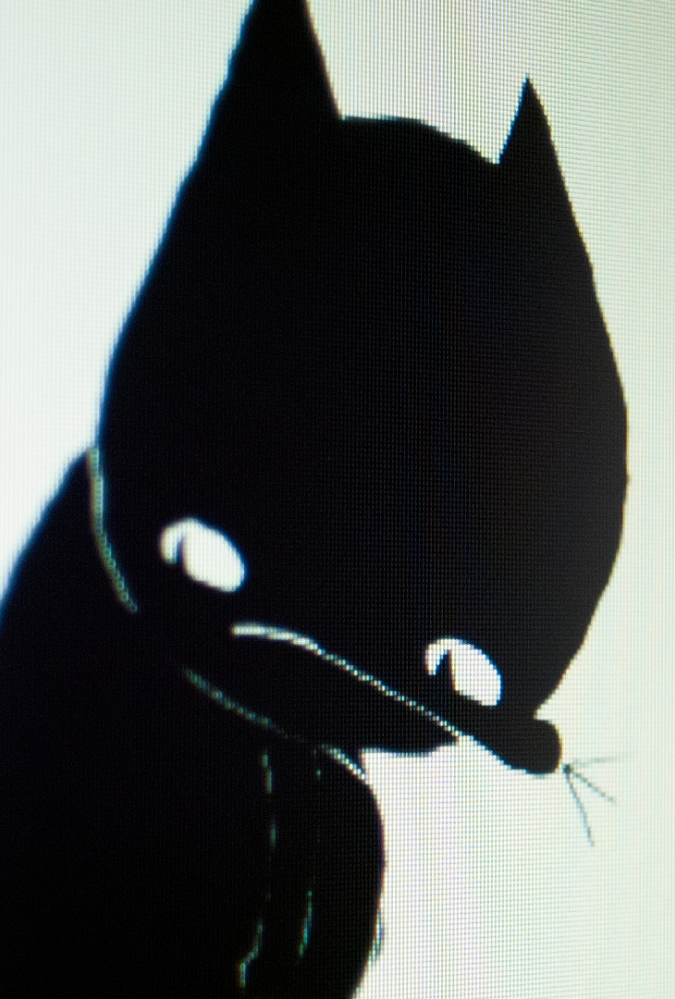 A screenshot of a computer screen. A cartoonish figure of a black cat. Still from A Cat Called Dom