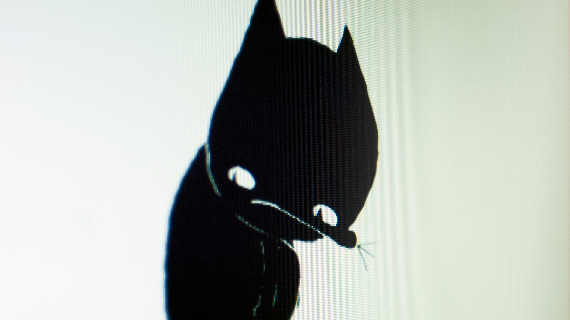 A screenshot of a computer screen. A cartoonish figure of a black cat. Still from A Cat Called Dom