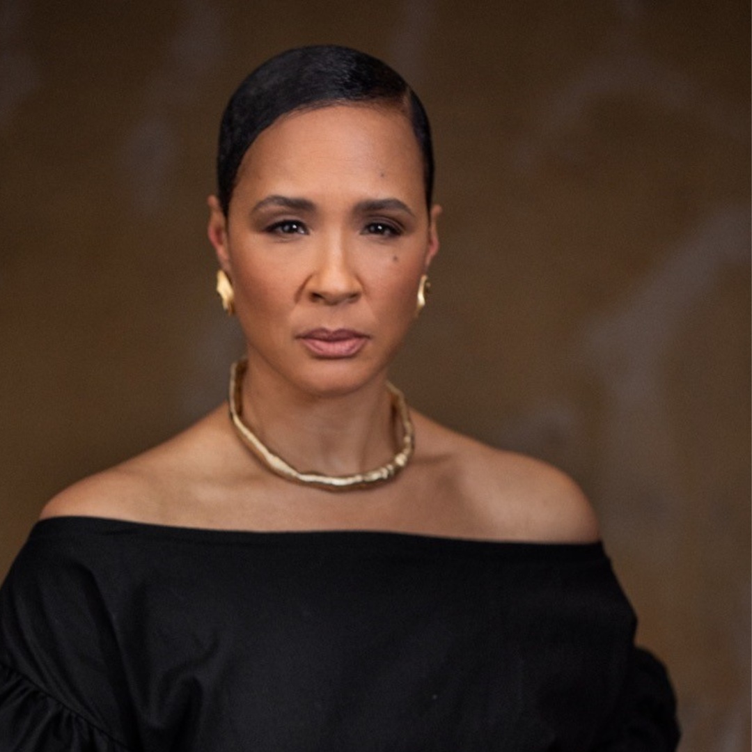 Headshot of actress Golda Rosheuvel, who wears a black dress and chunky gold necklace. Image courtesy of Sky