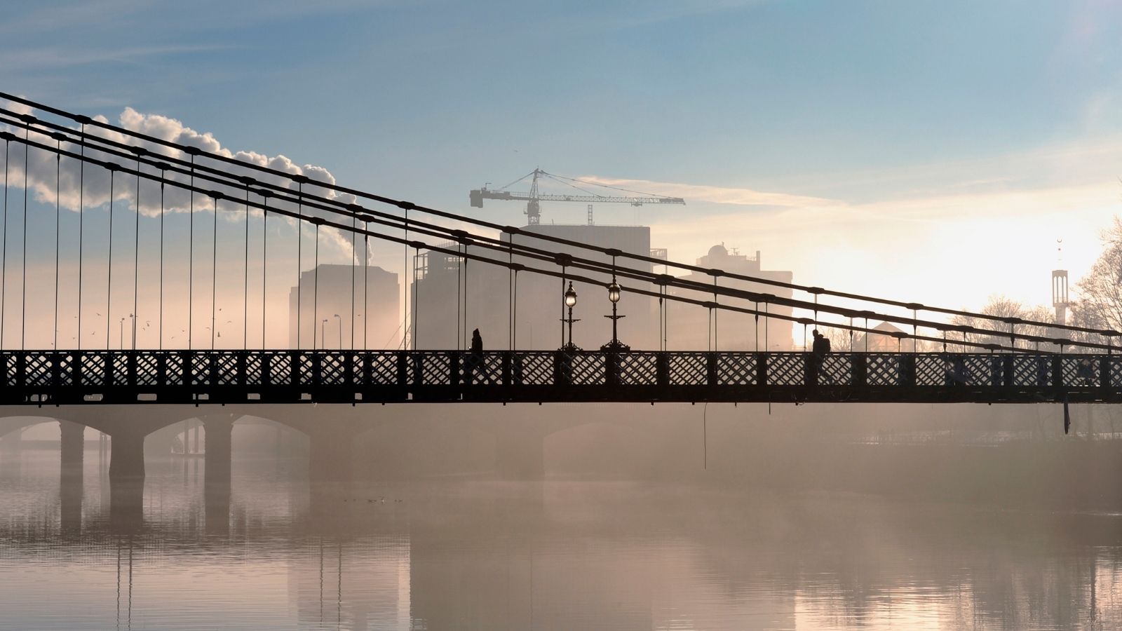 A bridge in Glasgow over glistening water