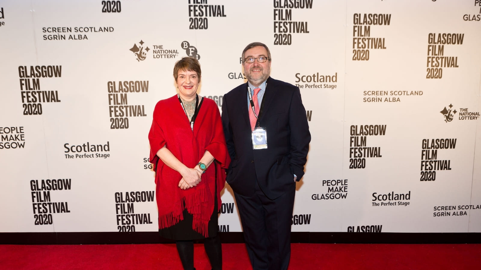 Allison Gardner and Allan Hunter smile together on the red carpet