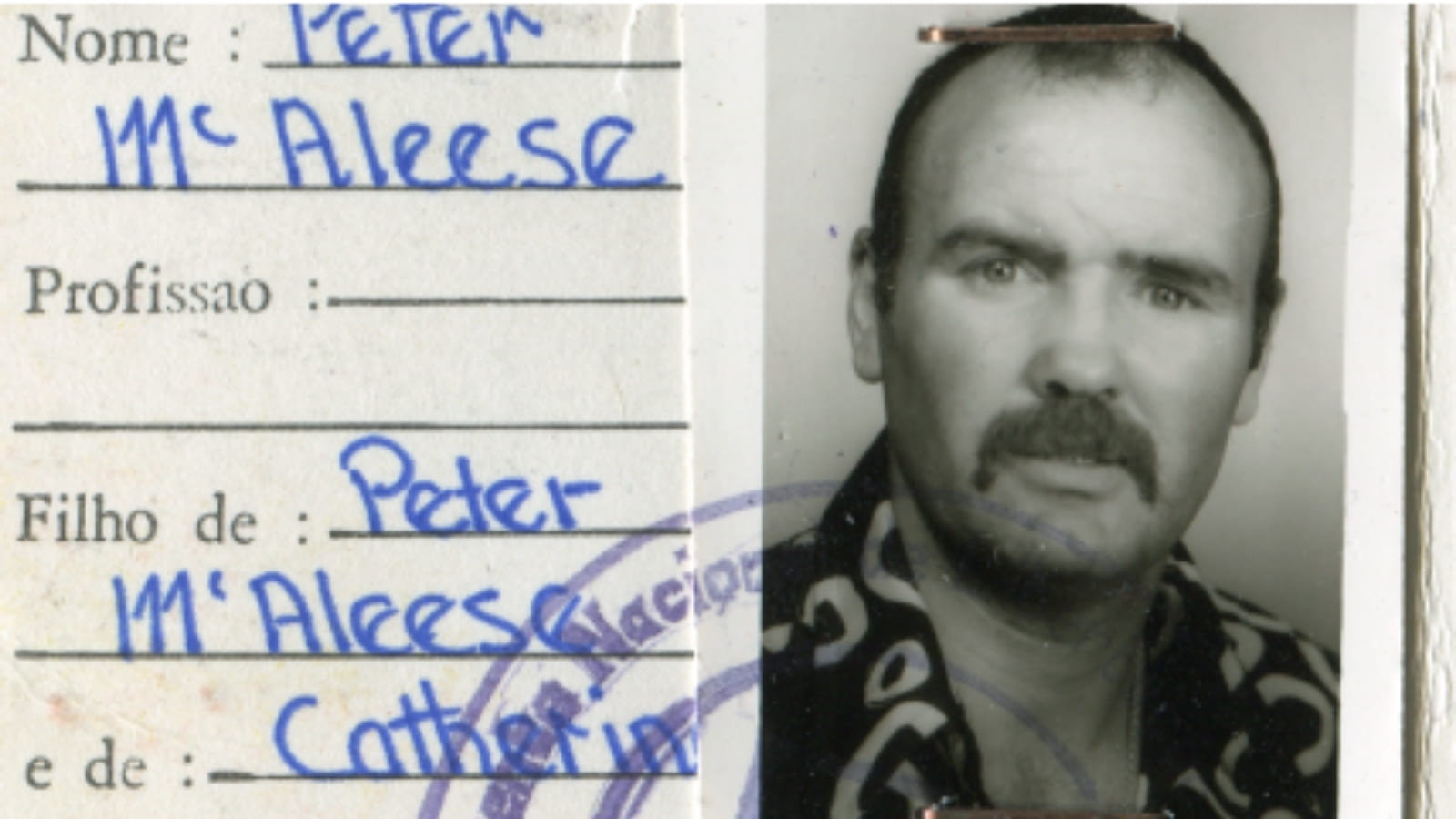Scanned image of an identity card with an image of a man to the right