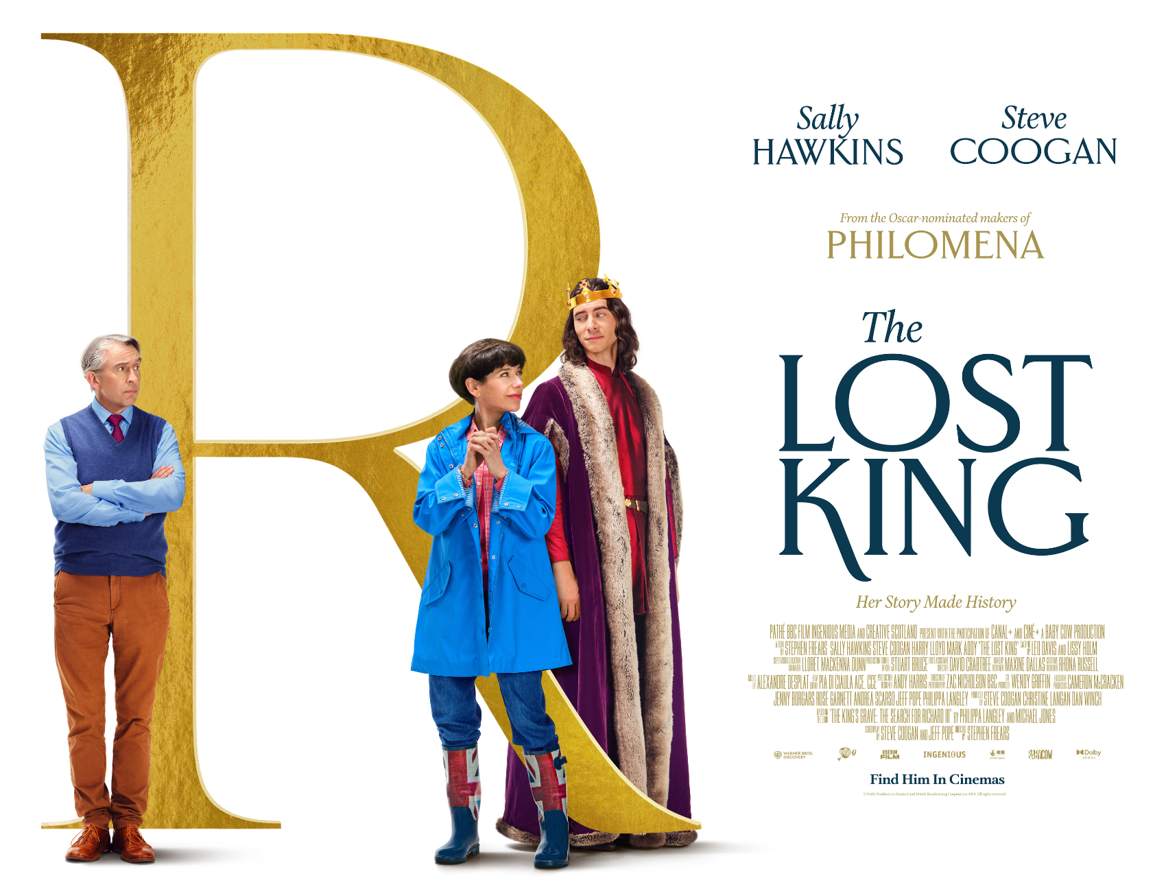 Woman in blue coat, a man with a crown, and another man stand in front of a large R. Text reads "The Lost King"
