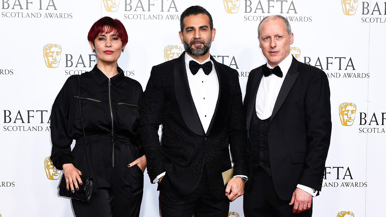 GLASGOW, SCOTLAND - NOVEMBER 19: Hassan Nazer (C) attends the 2023 BAFTA Scotland Awards held at the DoubleTree by Hilton Glasgow Central on November 19, 2023 in Glasgow, Scotland. (Photo by Euan Cherry/BAFTA/Getty Images for BAFTA)