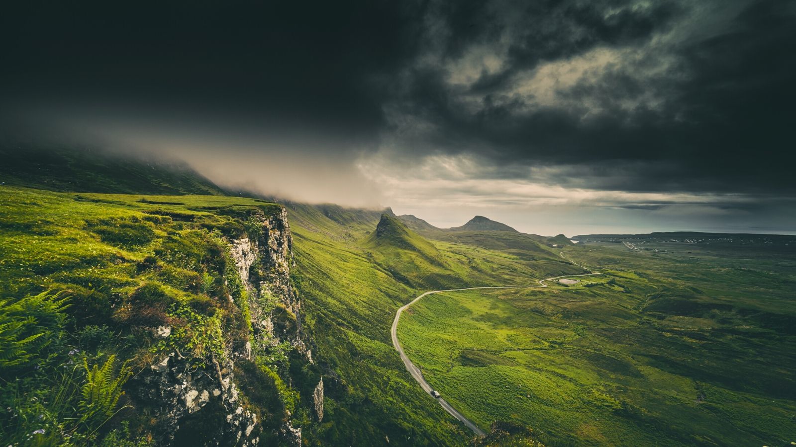 A dark and moody image of the Scottish Highlands