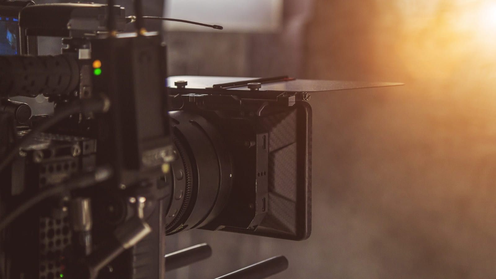 Close up image of a film camera on a film set studio